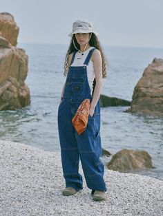 This is a minimal and casual overall pants by MAGOODGAN that is made out of high quality and sturdy fabric. With design detail that gives a minimal and comfortable mood, you can style it with various items for a clean daily outfit. - Workwear style carpenter overall- Stone washed vintage fabric- Adjustable strap on the waist Overall Pants Outfit, Oversized Overalls Outfit, Woman In Overalls, Carpenter Pants Outfit, Oversized Overalls, Overall Pants, Overalls Outfit, Workwear Style, Workwear Fashion