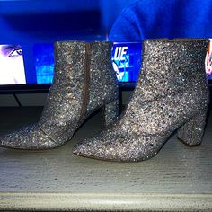 These Boots Were A Gift For My 21st Birthday For Vegas. Only Worn Three Times Glamorous Party Boots With Glitter Accents, Glamorous Party Boots With Bling, Sparkling High Heel Boots For Party Season, Shimmer Round Toe Boots For Party, Party Boots With Shimmer And Round Toe, Silver Sequined Boots For Party, Glamorous Metallic Silver Boots With Pointed Toe, Silver Sequined Party Boots, Glamorous Metallic Silver Pointed Toe Boots