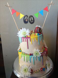 a birthday cake decorated with colorful icing and decorations