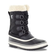 Made for those snowy outings, these women's Sorel Carnival black/stone winter boots are a versatile winter staple. Made of durable nylon upper with waterproof seam-sealed construction, these winter boots showcase a round duck toe front, D-ring lacing system, soft faux shearling cuff, plush lining, removable 6 mm washable recycled felt inner boot, 2. 5 mm bonded felt frost plug, and a vulcanized rubber shell with a herringbone-tread outsole. | Sorel Women's Carnival Waterproof Winter Boot in Blac Waterproof Winter Boots, Sorel Womens, Sorel Shoes, Sorel Winter Boot, Black Stone, D Ring, Boot Shoes Women, Winter Boots, Winter Boot