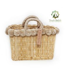 "🧺 lovely Basket Oblong Small Pom Pom beige 🧺 🌿 Can be carried by hand 🌿 Our Baskets are classic French Market Basket. The perfect choice for shopping trips, picnics, days at the beach. Not only, they're eco-friendly, they look great in the home for storing toys or magazines. Handwoven by women in Morocco using palm leaf, and crafted in our workshop, they are both sturdy and flexible. With rope and wool handles for comfortable carrying. APPROX SIZE : ⚬ Straw Basket: H22 cm x L35 cm x P13 cm Neutral Rectangular Straw Bag With Handles, Rectangular Neutral Straw Bag With Handles, Beige Straw Shopping Bag With Rolled Handles, Cream Rectangular Straw Bag With Bamboo Handle, Chic Beige Straw Bag For Market, Beige Basket Beach Bag With Rolled Handles, Beige Straw Bag With Bamboo Handle For Market, Beige Basket Straw Bag For Market, Beige Basket Beach Bag With Bamboo Handle