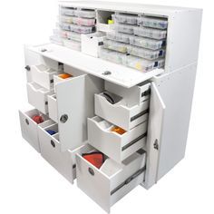 an office desk with drawers and file cabinets