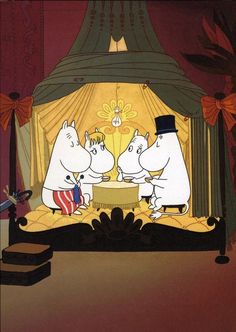 the three moomias are having a tea party in front of an elaborate stage