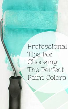 a black vase sitting on top of a table next to a blue wall with the words professional tips for choosing the perfect paint colors