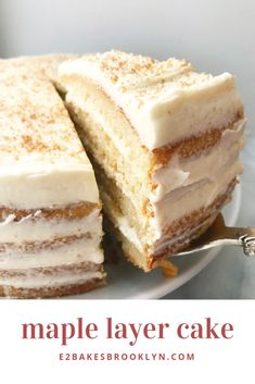 a close up of a piece of cake on a plate with the words maple layer cake