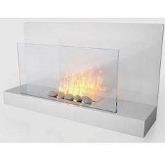 a glass fireplace with rocks on the bottom and flame coming out from it's sides