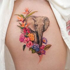 Top 30 Trendy Elephant Flower Tattoo Designs | Inku Paw Elephant Flower Tattoo, Elephant Fashion, Small Elephant, Tattoo Shows, Traditional Tattoo Design, Bouquet Design, Great Tattoos