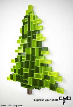 a green christmas tree made out of cubes on a white background with the words express your shelf below it