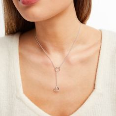 Dangling from the end of a rope chain looped through a circle, a heart hangs from this charming lariat necklace for her in sterling silver. Diamond accents add sparkle to the necklace, which measures 18 inches in length and secures with a spring ring clasp. Valentine's Day Round Charm Necklace, Silver Lariat Necklace With Round Pendant As Gift, Sterling Silver Round Lariat Necklace Gift, Sterling Silver Lariat Necklace Gift, Silver Dainty Lariat Necklace, Adjustable Sterling Silver Lariat Necklace With Round Pendant, Silver Round Lariat Necklace In Dainty Style, Valentine's Day Round Pendant Charm Necklace, Silver Lariat Jewelry With Heart Charm