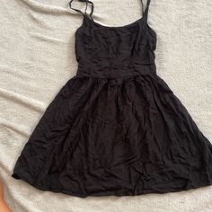 Never Worn Black Sundress For Spring Party, Black Spring Party Sundress, Black Party Sundress For Spring, Chic Black Sundress For Party, Chic Black Party Sundress, Black Sundress For Summer Night Out, Elegant Black A-line Sundress, Chic Black Sundress For Casual Wear, Chic Black Sundress For Spring