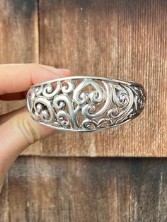 This cuff bracelet tests as Silver and has lovely thick filigree on the domed front. The band is unmarked and the opening in back measures 1 1/4 inches across. The full length of the bracelet across is about 2 3/4 inches so once it is on the wrist there is more wiggle room. The bracelet is in great condition and it is pretty shiny as it is but the metal can be polished up more if desired. Silver Cuff Bracelet, Pretty And Cute, Silver Cuff, Warsaw, Vintage Silver, Cuff Bracelet, Cuff Bracelets, Jewelry Bracelets, Full Length