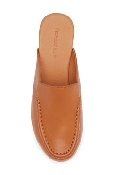 A moc toe and loafer-inspired topline add sophisticated elements to a leather mule lofted by a chunky platform and block heel. 3" heel; 1 1/4" platform Cushioned footbed Leather upper and lining/rubber sole Imported Platform Loafers, Loafer Mules, Chunky Platform, Leather Mules, Mule, Cognac, Block Heels, Rubber Sole, Leather Upper