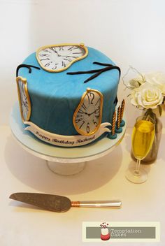 there is a cake with a clock on it