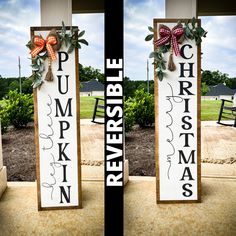 two wooden signs with bows on them sitting in front of some bushes and trees outside