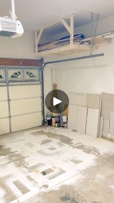 an empty garage is shown with the door open and no one in it or something else