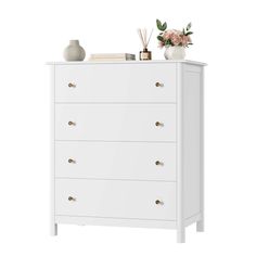 a white chest of drawers with flowers on top