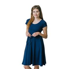 An easy fit and flare silhouette and comfy stretch-blend organic cotton make this nautical-inspired dress a spring and summer staple. Features short sleeves, a rounded neckline, and a faux waist tie for that feminine touch. Flattering fit and flare cut. The ultimate cozy dress you'll want to wear all season long. Cozy Dress, Tie Waist Dress, Knit Tie, Womens Tie, Summer Staples, Navy Dress, Inspired Dress, Waist Tie, Knit Dress