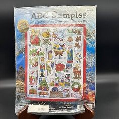 Abc Distributing Catalog Christmas, Christmas Sampler, Candle Holder Crafts, Which Craft, Bee Supplies, Yarn Tools, Sampler Cross Stitch, Ceramic Wall Lights, Hand Embroidery Kits