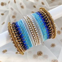 Blue Bangles Set, Bangles Ideas, Antique Gold Bangles, Blue Bangles, Desi Jewelry, Bangle Stack, Henna Style, Green Clutches, Indian Bridal Jewelry Sets