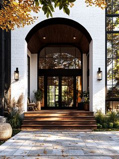 the front entrance to a home with steps leading up to it