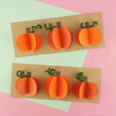 two pieces of paper with cut out pumpkins on them