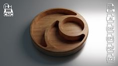 an image of a wooden bowl with two circles on the bottom and one in the middle