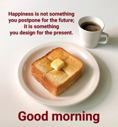 a white plate topped with toast and butter on top of a table next to a cup of coffee