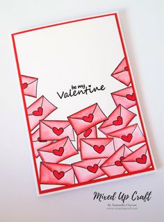 a valentine's day card with envelopes and hearts