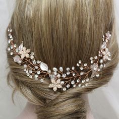 Wedding hair vine/back headpiece   Colour:  copper/rose gold /clear/ivory With loops for bobby pins (hair pins NOT included!) Measurements: approx  9.5 x 1.5 inches (please note  not  long) Materials:  metal leaves and flowers, clear crystal rhinestones, ivory faux pearls, copper wire . This listing for one hair vine  in copper/rose gold  tone (silver tone  or gold hair vine  available in other listing). Great for wedding or other celebration. MORE ACCESSORIES: https://www.etsy.com/uk/shop/BridalArtDeco?ref=listing-shop-header-item-count&section_id=23918122 Please note some images have been enlarged to allow for details to be shown. Read the descriptions for details on actual size of each item. In all my shop listings I have made every effort to ensure that the images match the item as clo Headpiece Wedding Hair, Gold Hair Vine, Bobby Pin Hairstyles, Gorgeous Hairstyles, Vine Wedding, Wedding Hair Piece, Rose Gold Bridal, Copper Rose, Bridal Hair Vine