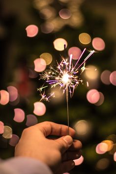 someone holding a sparkler with the words celebrate july 4th with a super - simple fireworks study