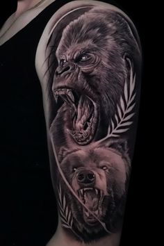 a woman with a black and white tattoo on her arm showing an image of two bears