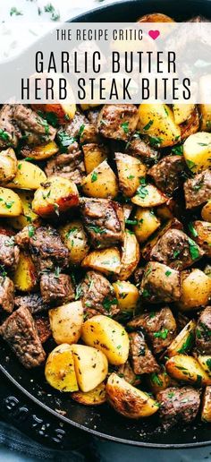 garlic butter steak bites with potatoes in a skillet