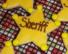 decorated cookies with the word sheriff on them