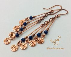 Long dangles cascading from chain with stone beads and spirals. Chain Earing, Earring Design Ideas, Wire Wrapped Stone Jewelry, Wire Jewelery, Wire Wrap Jewelry Designs, Diy Jewelry Earrings, Wire Wrapped Jewelry Diy, Wire Wrapped Jewelry Tutorials, Copper Wire Jewelry