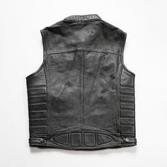 Motorcycle Enthusiasts! Want to create a layered outfit? The Motorcycle Rivets Genuine Leather Vest is a good choice for you. Because wearing a leather vest will expose your underlying shirt or top. A long sleeve shirt or sweatshirt with a good vest is enough to keep you warm when riding in cold temperatures. Features: 2.75-3.0 oz (1.1-1.2 mm) medium weight Cowhide Premium Leather shell Twin front chest pockets with zipper closure Twin handwarmer pockets with zipper closure Reinforced armholes a Layered Outfit, Leather Motorcycle Gloves, Motorcycle Jeans, Heated Clothing, Denim Vests, Heated Gloves, Motorcycle Pants, Motorcycle Vest, Open Face Helmets