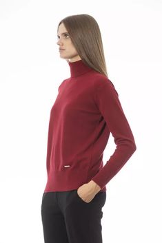 Elevate your knitwear repertoire with the epitome of Italian elegance by Baldinini Trend. This sumptuous turtleneck sweater embodies sophisticated warmth; a harmonious blend of 50% wool and 50% cashmere ensures a luxuriously soft touch. The vibrant red hue demands attention, while the fine ribbed knit at the neck cuffs, and hem add a refined texture. Accented with a chic monogram in metal, this sweater is a testament to Baldinini Trend’s commitment to luxury and style. Material: 50% Wool, 50% Ca Women Turtleneck, Turtleneck Style, Sweater Turtleneck, Cashmere Color, Sweater Trends, Womens Turtleneck, Perfect Wardrobe, Red Wool, Blue Wool