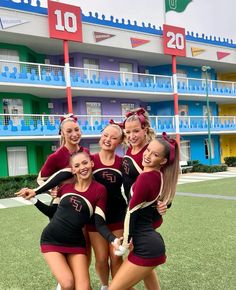 the cheerleaders are posing for a photo together