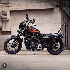 a motorcycle parked in front of a building