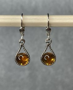 BALTIC AMBER Silver Earrings.Cognac Amber Stone Earrings with Sterling Silver. Amber Dangle Earrings With Lever Back Ear Wires, Hypoallergenic Brown Sterling Silver Earrings, Hypoallergenic Amber Dangle Earrings, Hypoallergenic Brown Round Earrings, Brown Teardrop Earrings For Formal Occasions, Formal Brown Teardrop Earrings, Hypoallergenic Brown Drop Earrings, Elegant Brown Hypoallergenic Earrings, Hypoallergenic Brown Dangle Earrings