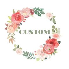 a floral wreath with the word custom written in white and pink flowers on top of it