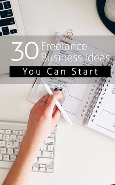 a person writing on a piece of paper next to a computer keyboard and mouse with the words 30 freelance business ideas you can start