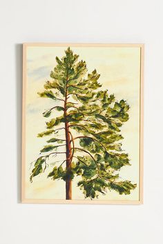 a painting of a pine tree on a white wall