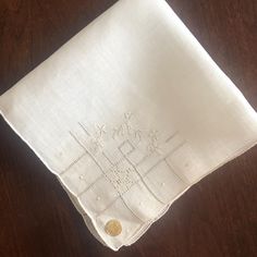 This is such a beautiful vintage hanky.  Fine Linen, drawn work.   It is creamy white, and measures 12 inches square (6x6 when folded).  Excellent vintage condition with no marks, holes or signs of wear. Free Shipping in the US! Please note this is a small item and will be sent in a regular envelope. To see all of my vintage handkerchiefs see here https://www.etsy.com/shop/huntingforhomewares?ref=search_shop_redirect&section_id=25742049 Vintage White Handkerchief As Gift, Classic Wedding Pocket Square Handkerchief, Vintage Cream Handkerchiefs As Gift, Vintage Cream Handkerchief As Gift, Vintage White Handkerchiefs For Gift, Elegant White Lace Handkerchiefs, Vintage White Handkerchief For Gifts, Vintage White Handkerchief Gift, Vintage Cream Handkerchiefs Gift