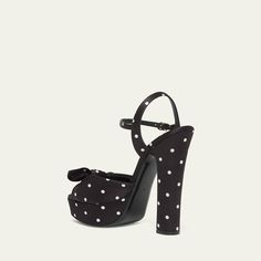 Dolce&Gabbana "Keira" polka dot satin platform sandals with knotted bow accent 5.31 in / 135 mm block heel Open toe Adjustable ankle strap Leather outsole Made in Italy Polka Dot Round Toe Sandals For Party, Polka Dot High Heel Evening Shoes, Spring High Heel Sandals With Polka Dot Pattern, Polka Dot High Heel Evening Heels, Polka Dot High Heel Sandals For Spring, Polka Dot High Heel Shoes For Evening, Polka Dot Round Toe Heels For Parties, Polka Dot High Heels For Evening, Polka Dot Heels For Summer Party