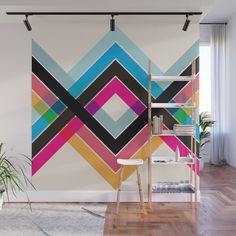 an abstract wall mural in a living room