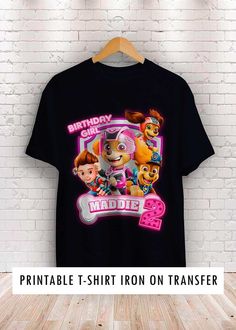 a birthday shirt with the characters from paw patrol on it in front of a brick wall