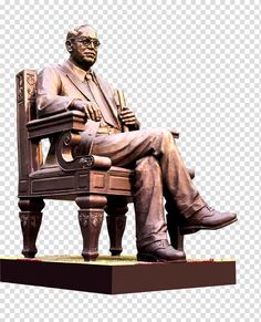 a statue of a man sitting on top of a bench