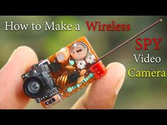 a hand holding a camera with the words how to make a wireless spy video camera