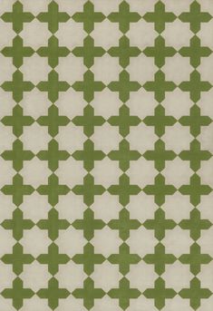 a green and white rug with squares on it