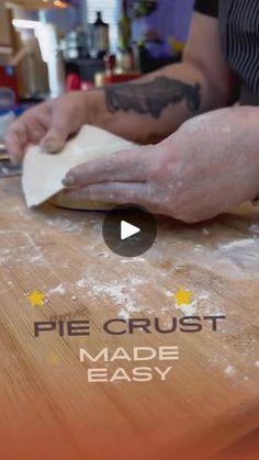 a person making pizza dough on top of a wooden table with the words pie crust made easy